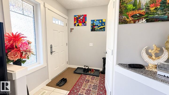 Property Photo:  8753 180A Avenue NW  AB T5Z 0G6 