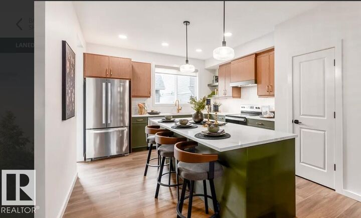 Property Photo:  20907 25 Avenue NW  AB T6M 2K7 