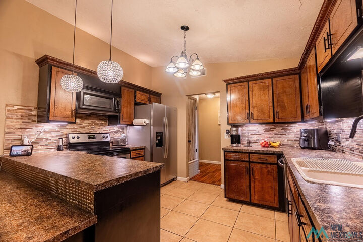 Property Photo:  1125 Parkland Dr  NM 88101 