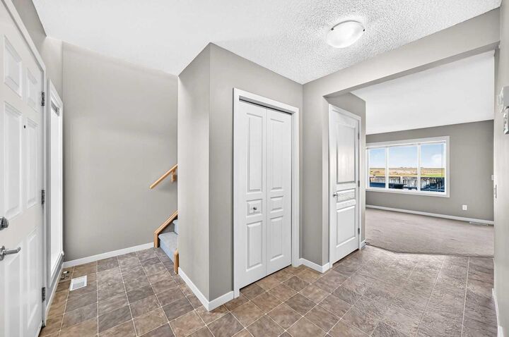 Property Photo: 306 Ranch Ridge Court AB T1P 0A6