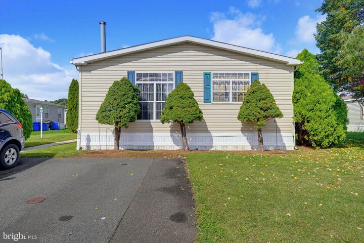 Property Photo: 302 Fox Pointe Drive 211 DE 19904
