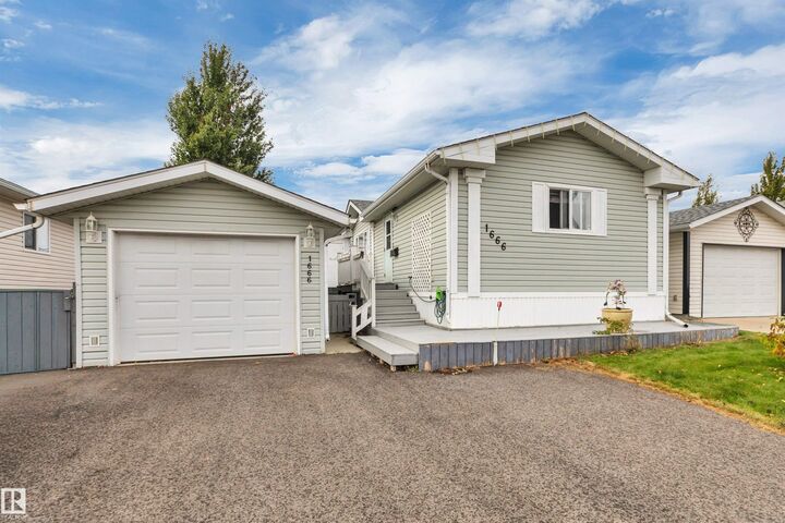 Property Photo:  1666 Jubilee Crescent  AB T8H 2J5 