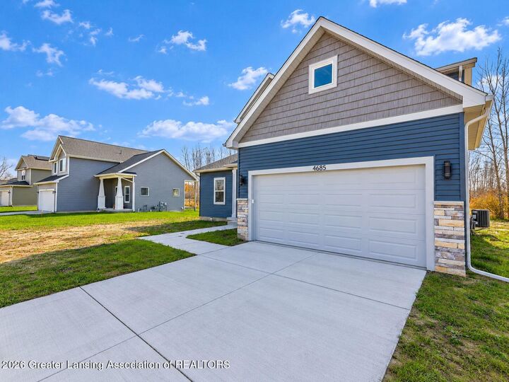 Property Photo:  4685 Eastlund Circle  MI 48842 