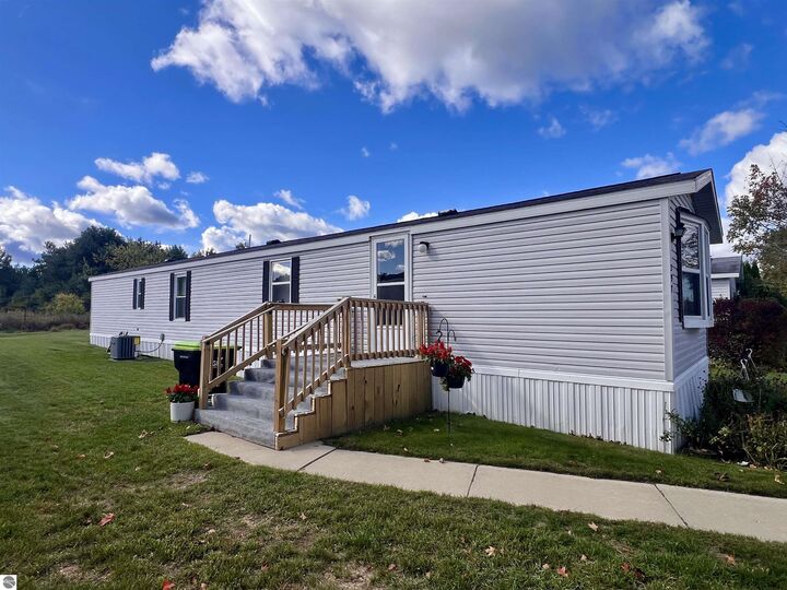 Property Photo:  397 Fairway Drive  MI 49601 