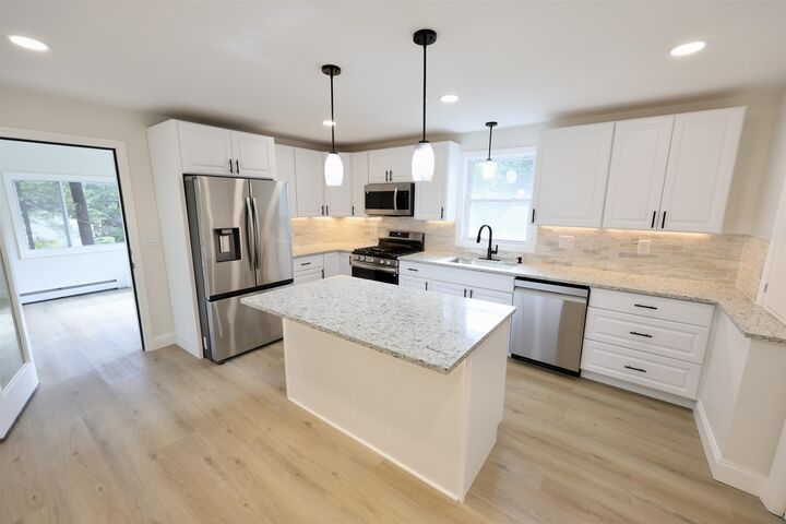 Property Photo:  19 New Searles Road  NH 03062 