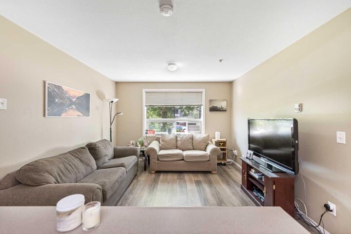 Property Photo:  180 Kananaskis Way 117  AB T1W 3C6 