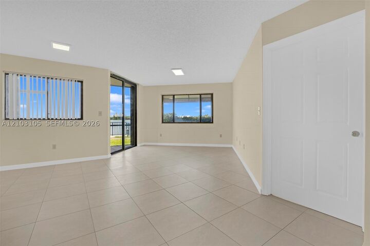 Property Photo:  15545 N Miami Lakeway N 106  FL 33014 