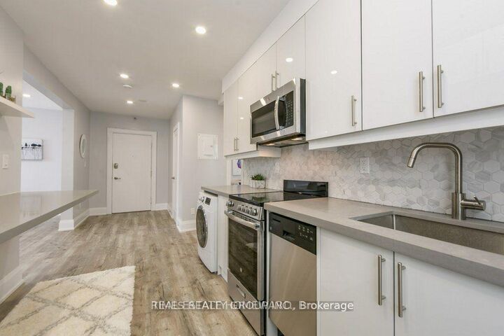 Property Photo:  1492 Dundas Street E 1  ON M4M 1S9 