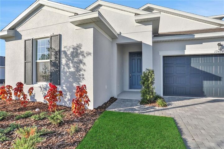 Property Photo: 13458 Turnleaf Blvd FL 33955