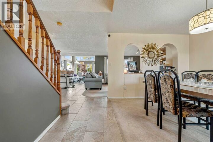 Property Photo:  27 Fairmont Garden Road South  AB T1K 7L2 