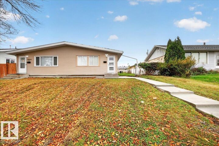 Property Photo:  13246 59 St NW  AB T5A 0R7 