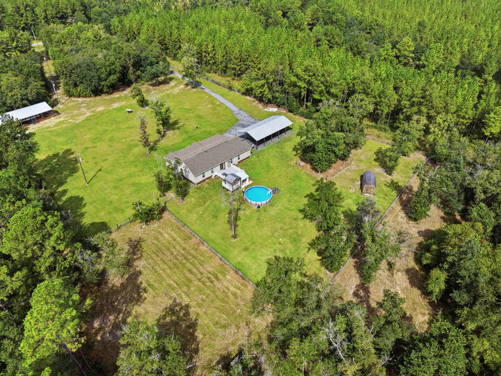 Property Photo: 6019 Old River Road FL 32531