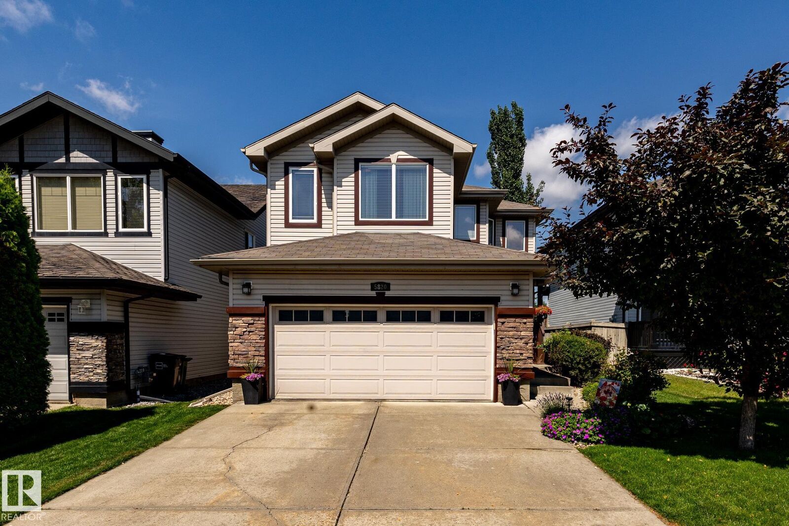 Property Photo:  5820 7 Avenue SW  AB T6X 0G6 