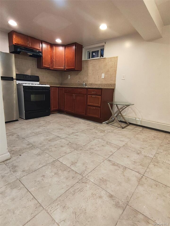 Property Photo: 121-07 Guy R Brewer Boulevard Ll NY 11434
