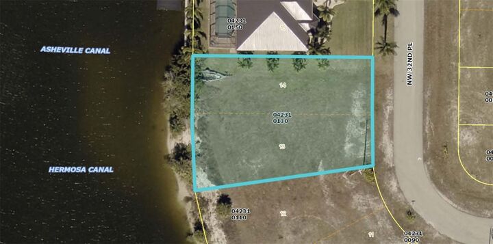 Property Photo:  914 NW 32nd Place  FL 33993 