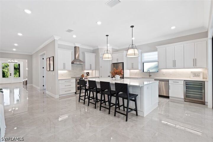 Property Photo: 240 Allamanda Way FL 34114