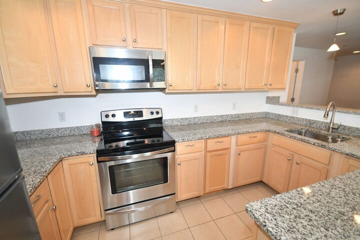 Property Photo:  1 Powder Mill Squre 107  MA 01810 