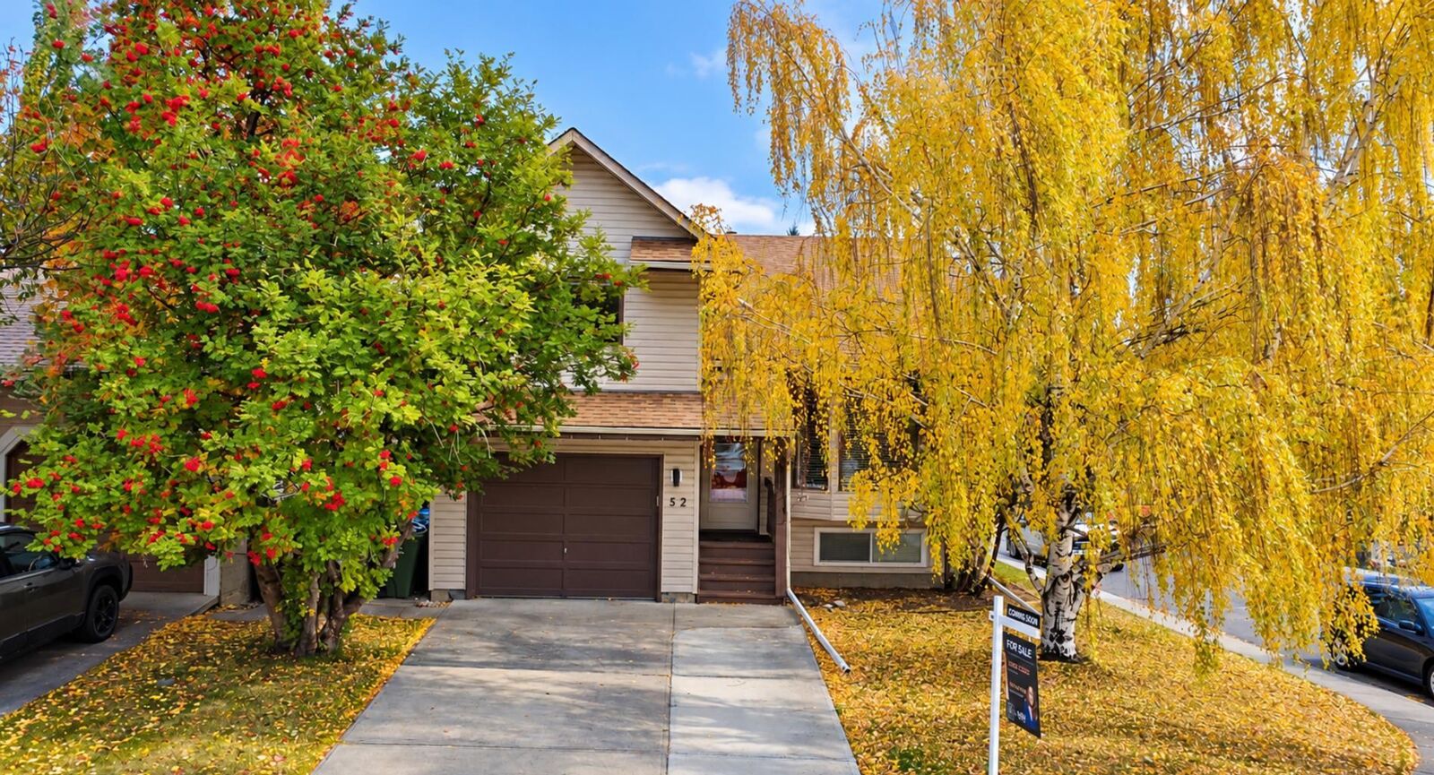 Property Photo:  52 Cedargrove Way SW  AB T2W 4V2 