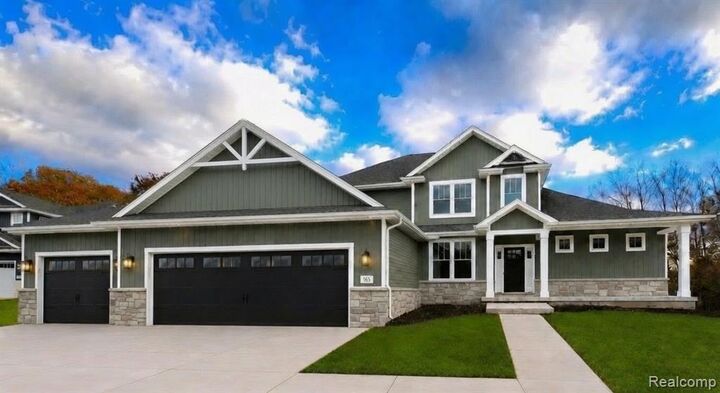 Property Photo:  626 Round Rock  MI 48843 