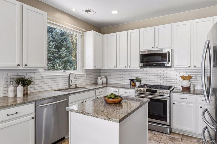 Property Photo:  1206 S Flat Rock Circle  CO 80018 