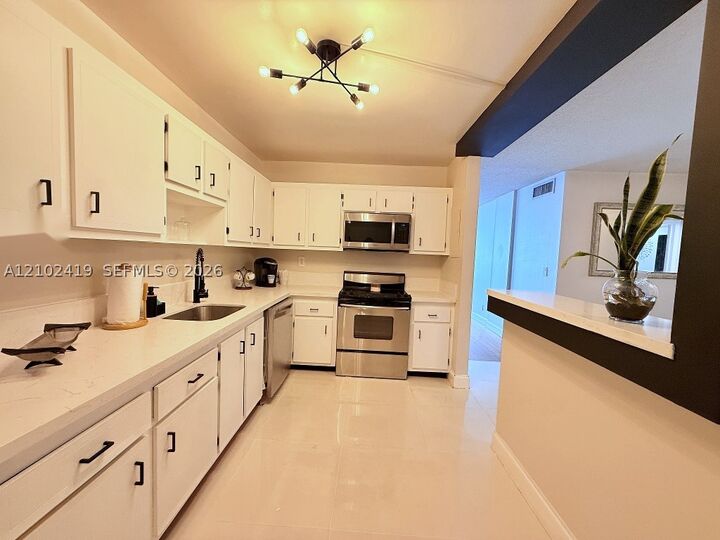Property Photo:  1465 NE 123rd St 401  FL 33161 