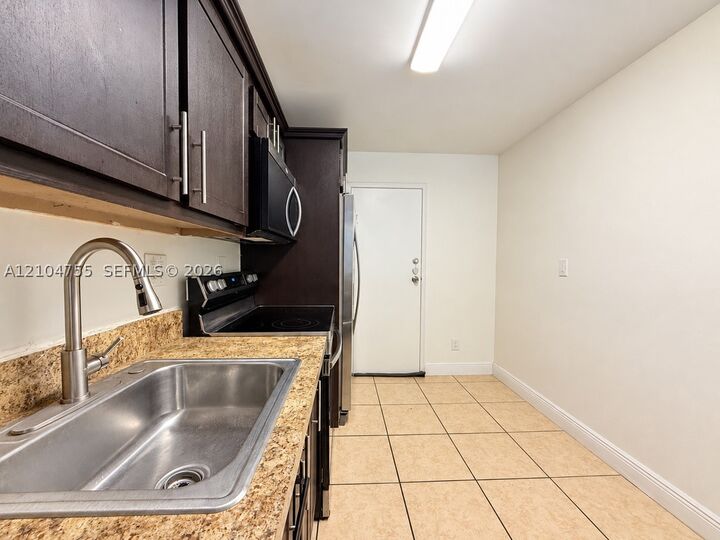 Property Photo:  1465 NE 123rd St 205  FL 33161 