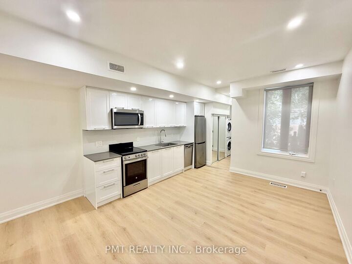 Property Photo:  8 Rusholme Park Crescent Main  ON M6J 2C9 