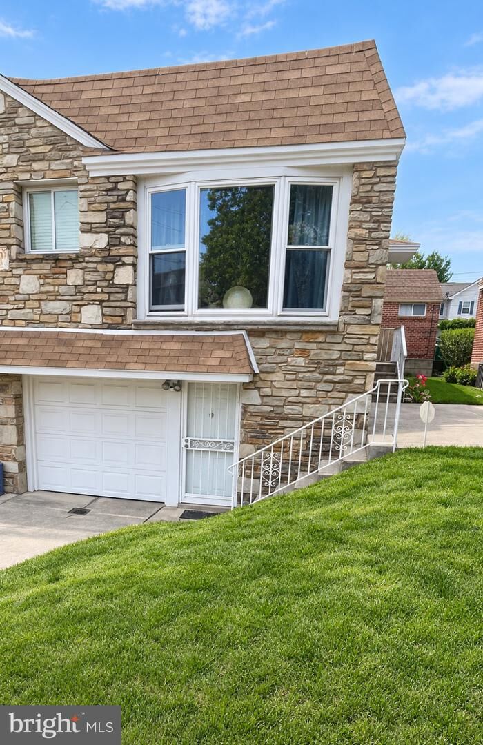 Property Photo:  1003 E Sedgwick Street  PA 19150 