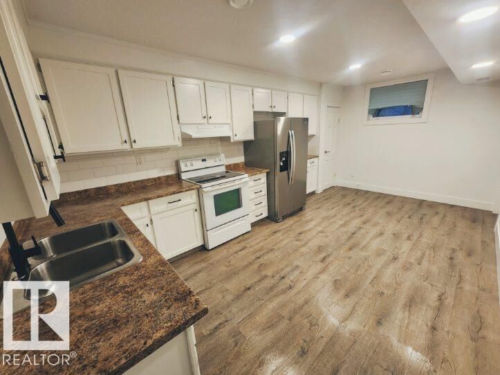 Property Photo:  12707 85 Street NW NW B  AB T5E 2Y6 
