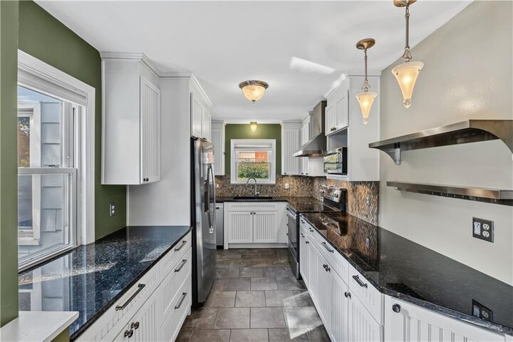Property Photo:  635 E 65th Street  MO 64131 