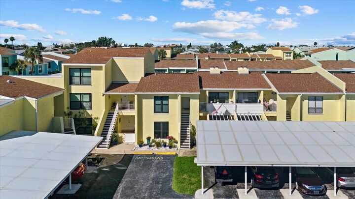 Property Photo:  1 Windrush Boulevard 19  FL 33785 
