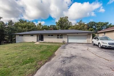 Property Photo:  6909 Christopher Drive  MO 63129 