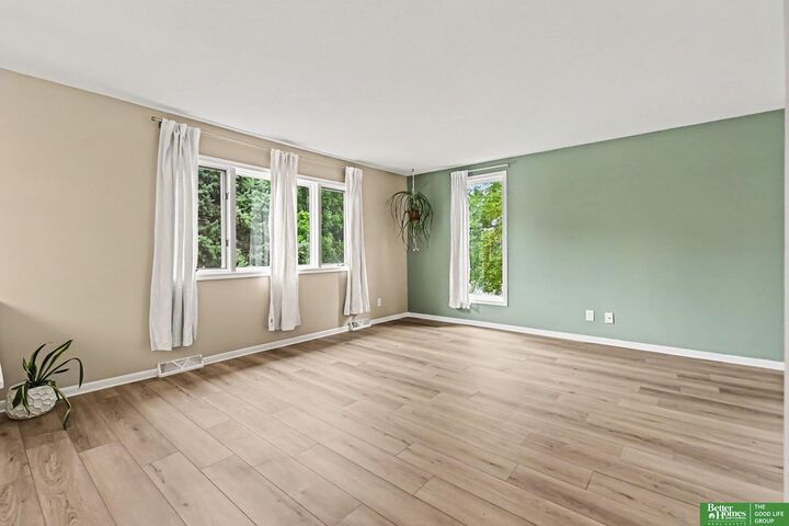Property Photo: 7830 Raven Oaks Drive NE 68152