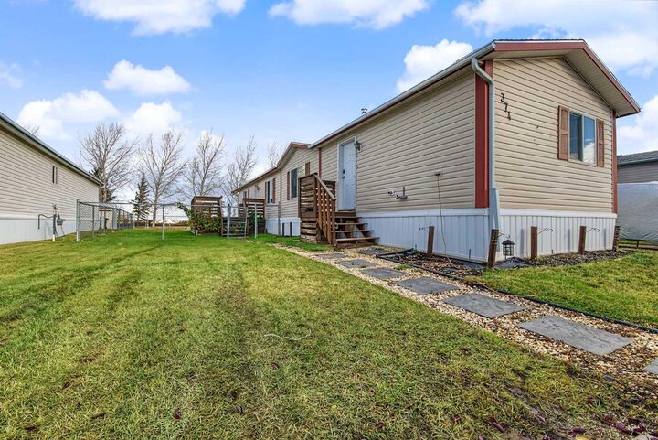 Property Photo: 374 Scott Lane AB T8W 5K5
