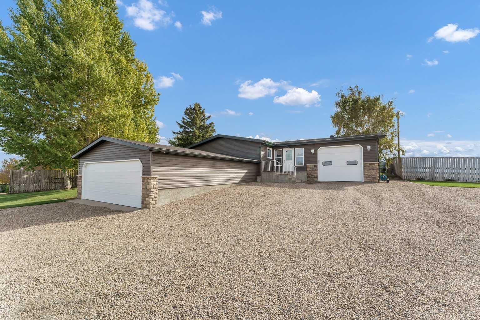 Property Photo: 12002 Range Road 65 AB T0K 1Z0