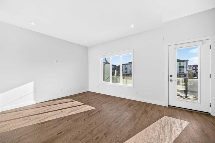 Property Photo:  6 Merganser Drive W 303  AB T1X 2Y2 