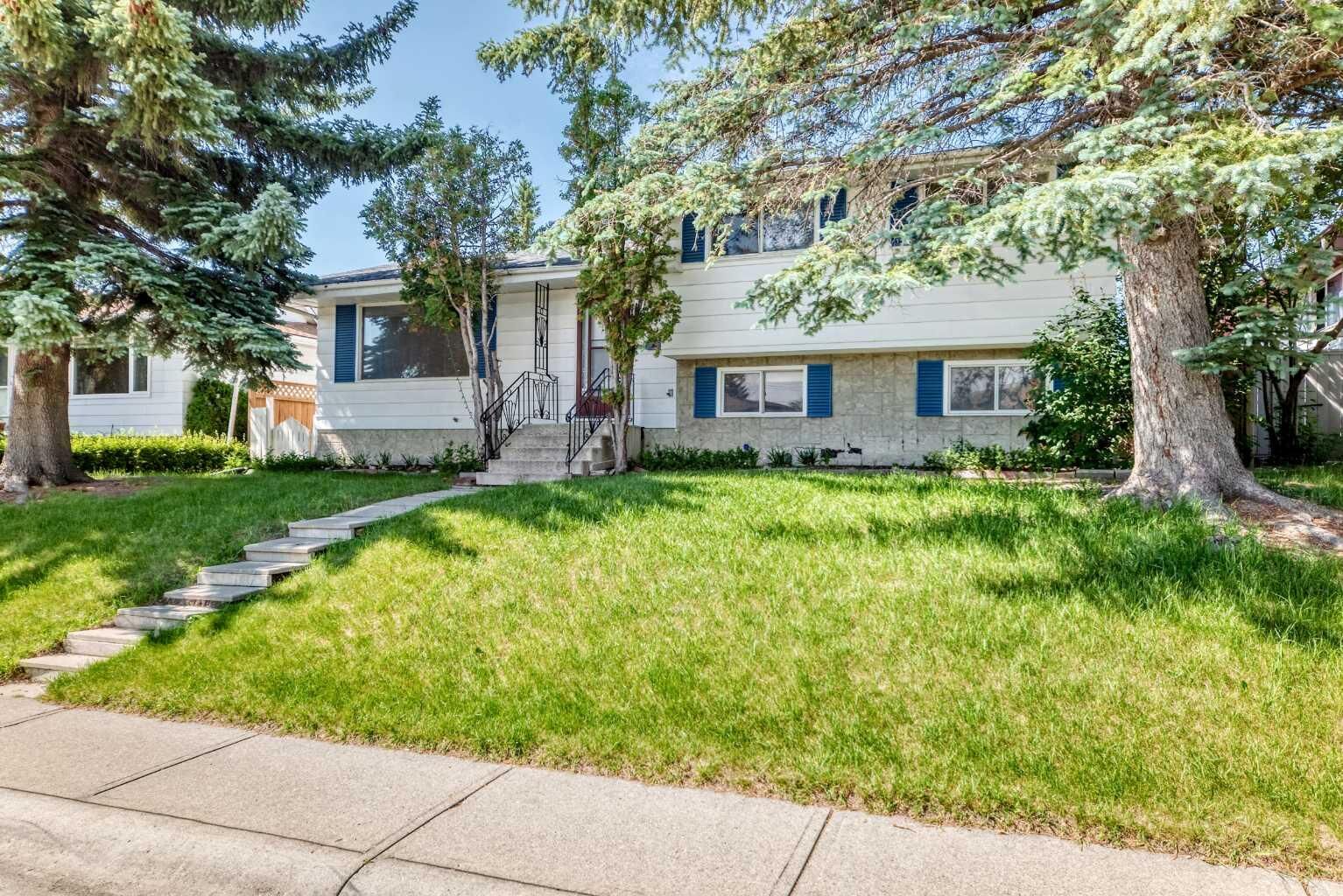 Property Photo:  6839 Huntridge Hill NE  AB T2K 4A1 