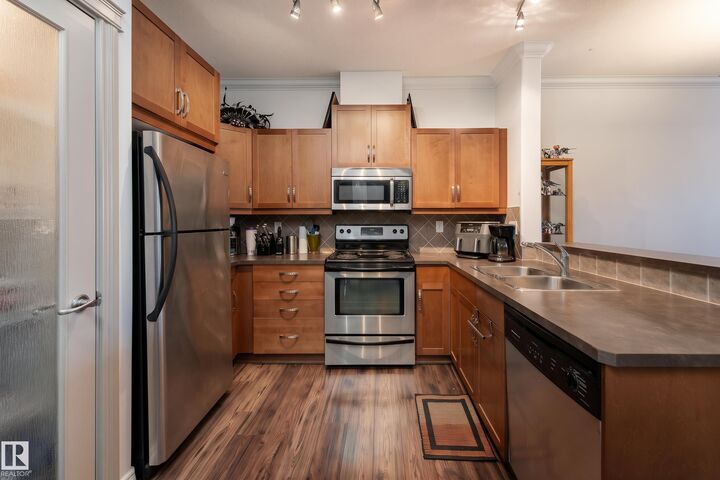 Property Photo: 10121 80 Avenue NW 211 AB T6E 0B9