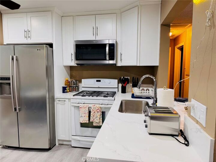 Property Photo:  148 W Ash A  CA 92832 