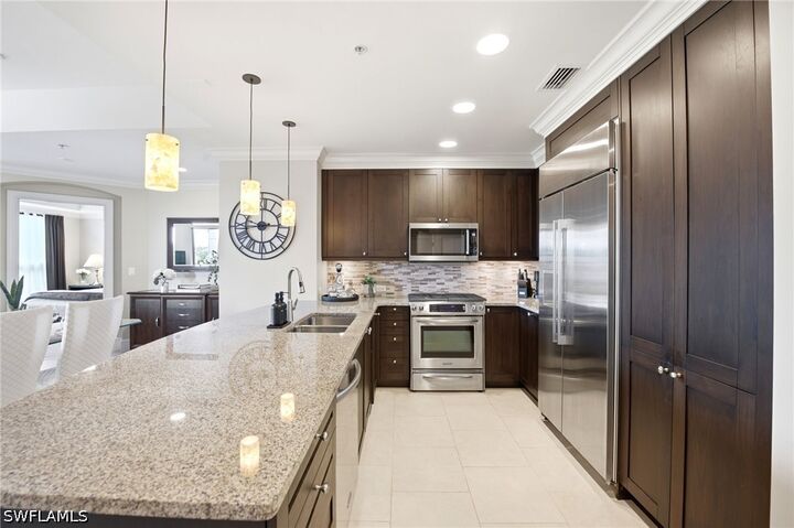 Property Photo:  9115 Strada Place 5205  FL 34108 