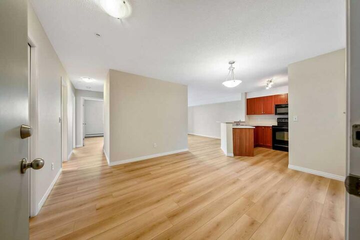 Property Photo: 505 Railway Street W 1103 AB T4C 2K9