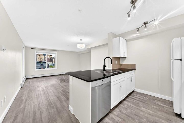 Property Photo:  403 Mackenzie Way SW 4118  AB T4B 3V7 