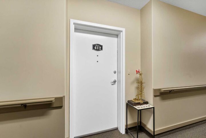 Property Photo:  2800 13 Avenue SE 412  AB T1A 3P9 