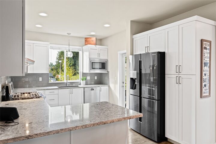 Property Photo:  12718  35th Avenue SE G-3  WA 98208 