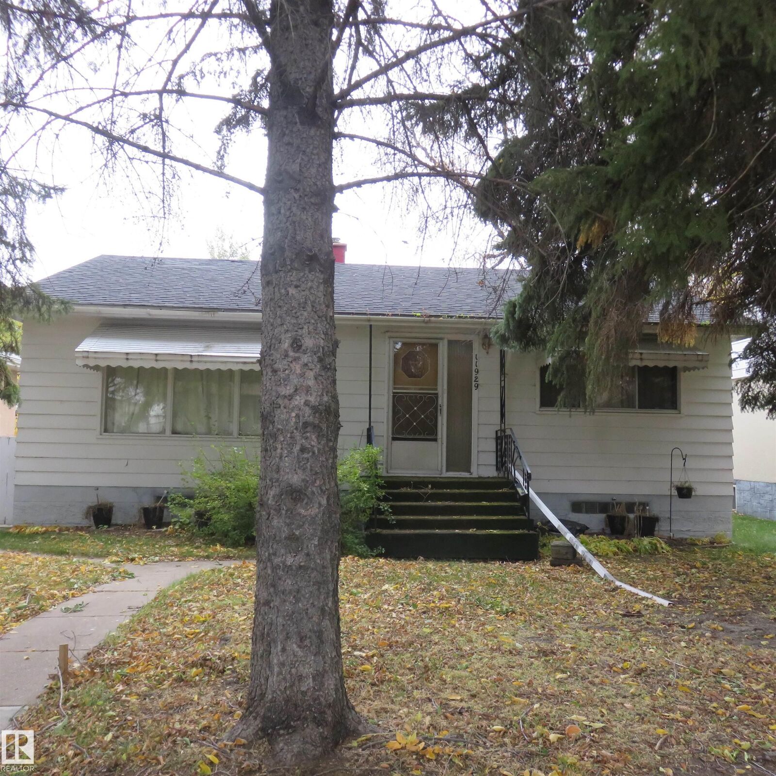Property Photo:  11929 52 Street NW  AB T5W 3J5 