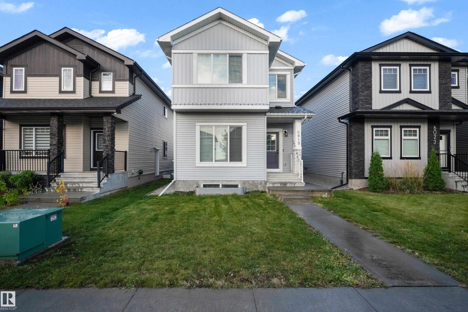 Property Photo:  6019 180 Avenue NW  AB T5Y 3W9 