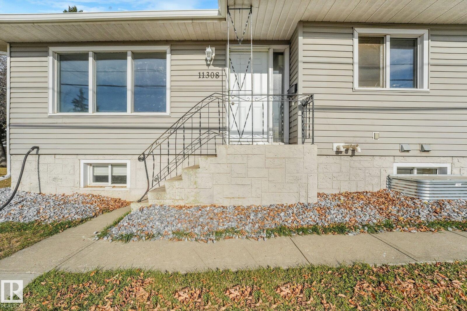Property Photo:  11308 129 Avenue NW  AB T5E 0L8 