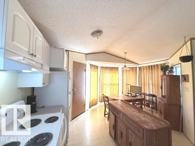 Property Photo:  1234 Lake Vista Crescent  AB T8H 1K5 