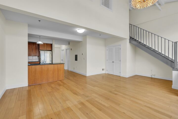 Property Photo:  300 Communipaw Ave 0233  NJ 07304 