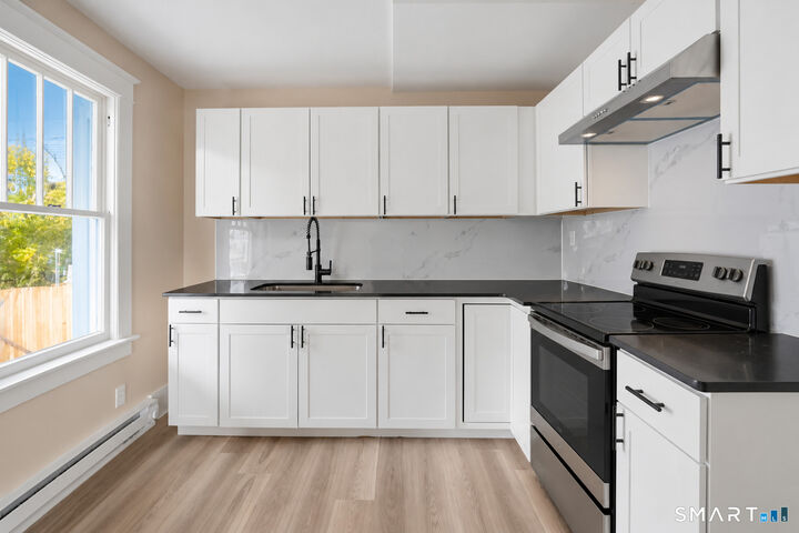 Property Photo:  9 Carpet Street  CT 06082 
